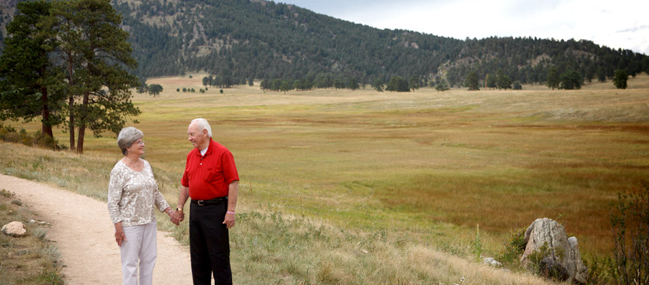 residents walking in meadow